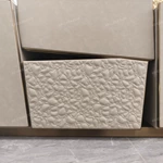 Asymmetrical Beige Sideboard with Embossed Textured Panels, Angled Drawer Fronts and Satin Bronze Frame